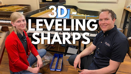 Brigham Larson and a technician, Adeline, kneel in front of a grand piano in the process of getting its sharps leveled. Title reads "3D - Leveling Sharps"